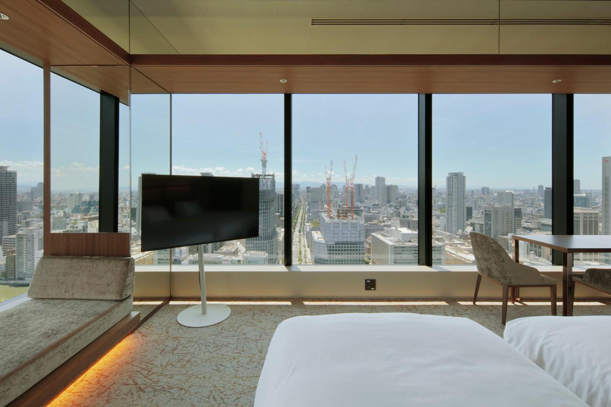 Candeo Hotels Osaka The Tower Zimmer foto A guest room at the hotel