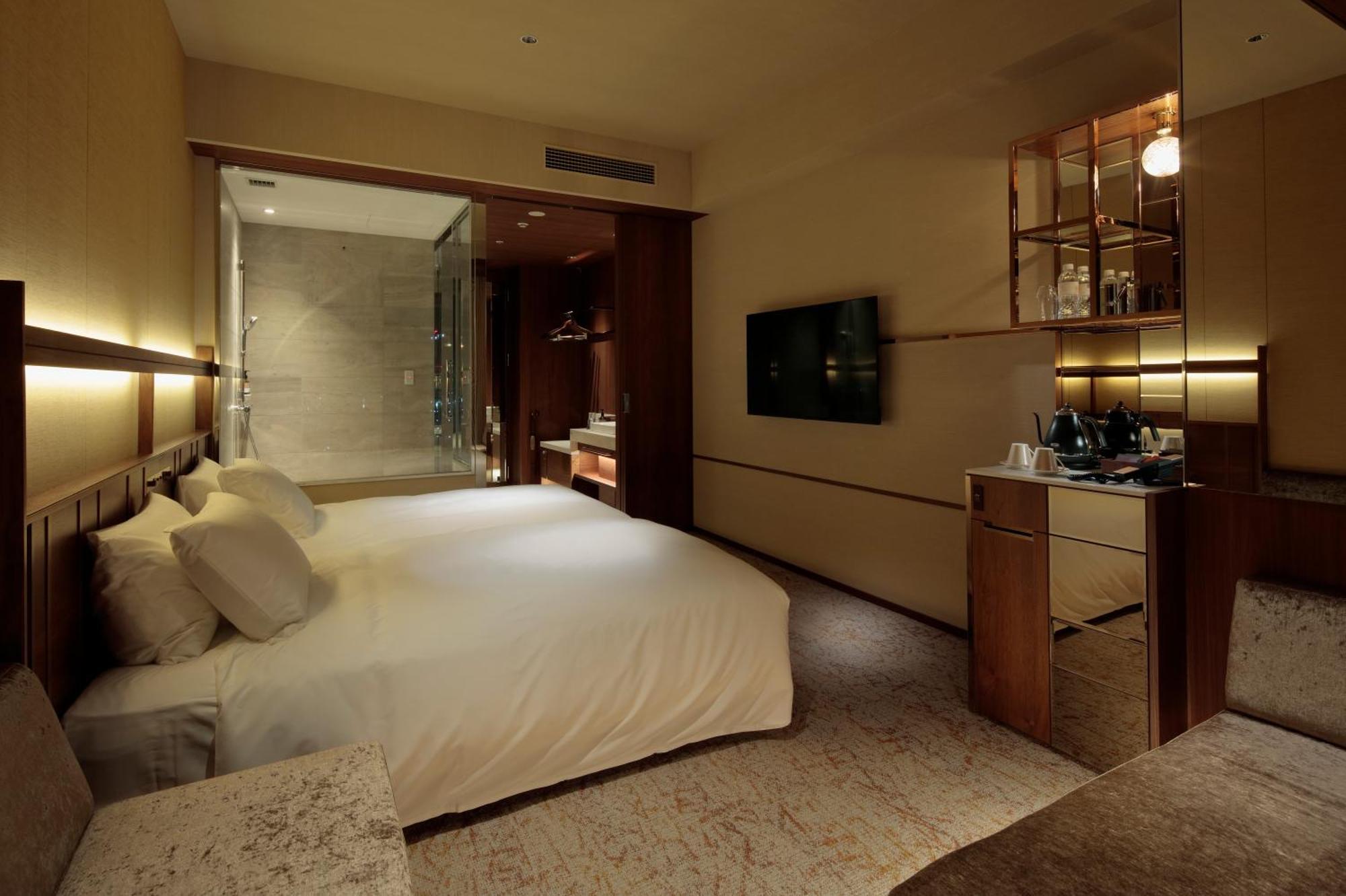 Candeo Hotels Osaka The Tower Zimmer foto A room at the hotel